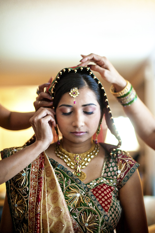 Indian bride getting ready in traditional wedding attire - wedding photo by top Atlanta based wedding photographers Scobey Photography